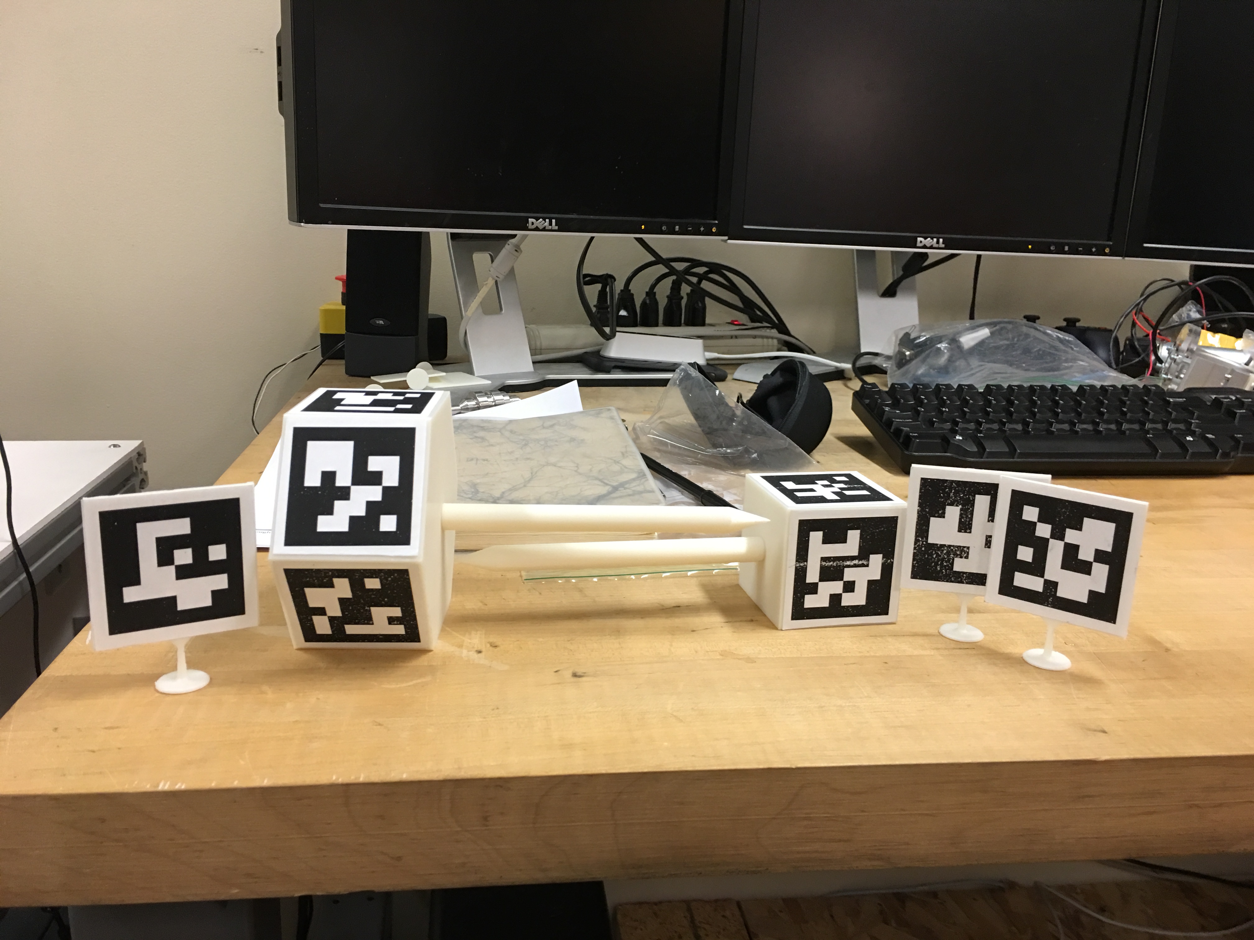  3 panels, a tool with a hexagonal head, and a tool with a cubic head